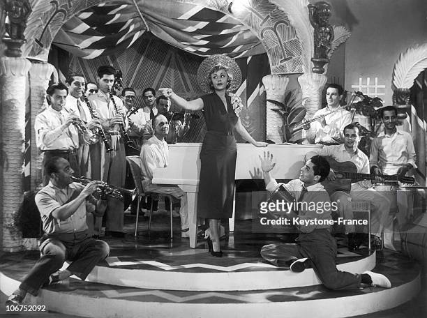French Singer-Actress Suzy Delair In A Scene Of The French-Italian Film Escapade, In 1950. This Film, Directed By Leo Joannon, Also Features American...