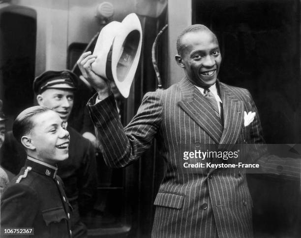 The American Athlete Jesse Owens At London'S Waterloo Train Station, On August 19, 1936. After His Success At The Olympic Games Of Berlin, The...