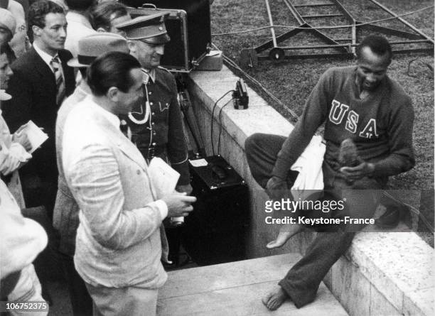 The American Sprinter Jesse Owens In Berlin On August 3 After His First Place Finish In The 200M At The Olympic Games. Jesse Owens Won The Gold Medal...