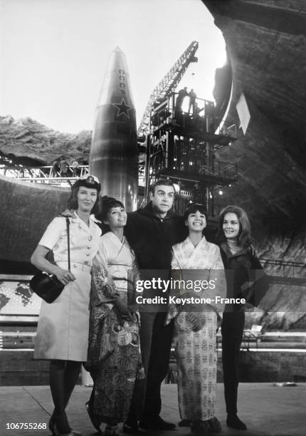 Sean Connery And James Bond Girls On The Film Setting Of You Only Live Twice. 1966. The actresses are Lois Maxwell, Akiko Wakabayashi, Mie Hama and...