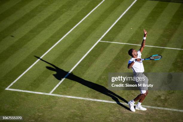 Gael Monfils of France in action against Richard Gasquet of France during the first round of The Wimbledon Lawn Tennis Championship at the All...