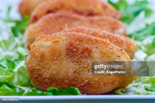 mediterranean cuisine - blue cheese croquettes. - panierter fisch stock-fotos und bilder