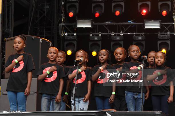 Children's Choir and Soweto Gospel Choir perform during the Global Citizen Festival: Mandela 100 at FNB Stadium on December 2, 2018 in Johannesburg,...