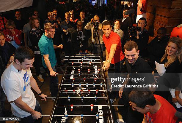James Milner, Adam Johnson, Rio Ferdinand, Javier Hernandez, Darron Gibson and Tinchy Stryder play table football as they mark the opening of Nike�s...