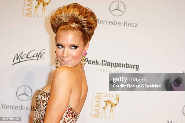 Host Sylvie van der Vaart poses on the red carpet for the Bambi 2010 Award at Filmpark Babelsberg on November 11, 2010 in Potsdam, Germany.