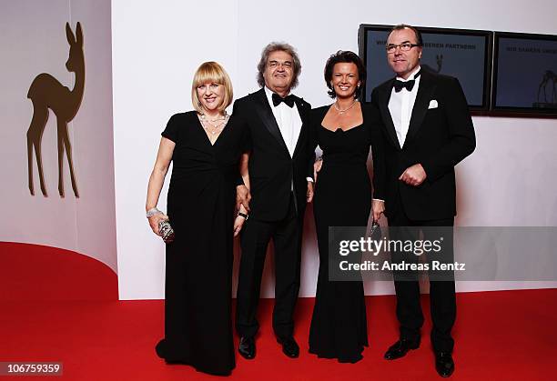 Patricia Riekel and Helmut Markwort, Clemens Toennies and his wife Margit Toennies arrive for the Bambi 2010 Award at Filmpark Babelsberg on November...