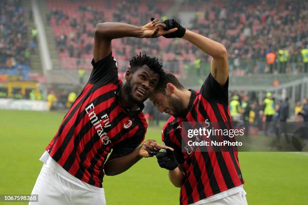 Frank Kessie of AC Milan celebrates with Hakan Calhanoglu of AC Milan after scoring the goal during the serie A match between AC Milan and Parma...