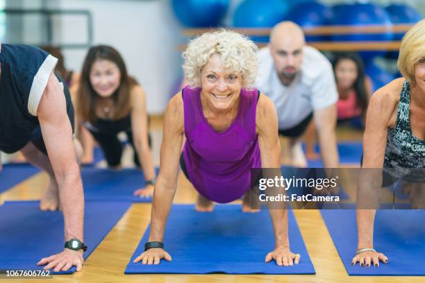 yoga class - ymca stock pictures, royalty-free photos & images