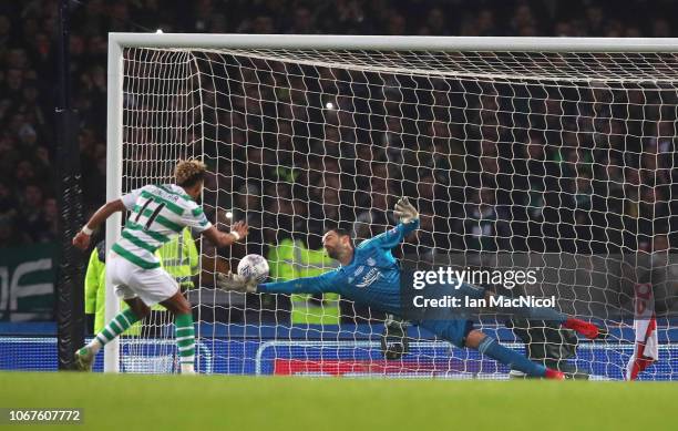 Joe Lewis of Aberdeen saves a penalty from Scott Sinclair of Celtic during the Betfred Cup Final between Celtic and Aberdeen at Hampden Park on...