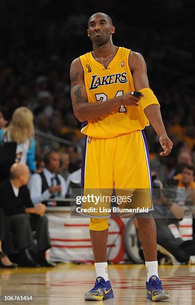 Kobe Bryant of the Los Angeles Lakers looks on during the game against the Houston Rockets at the Staples Center on October 26, 2010 in Los Angeles,...