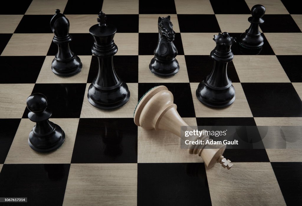 Checkmate Chess Pieces On Chess Board High-Res Stock Photo - Getty Images