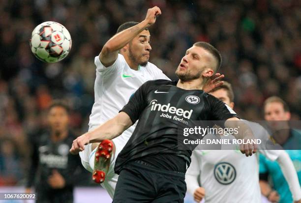 Wolfsburg's Brazilian defender William and Frankfurt's Croatian midfielder Ante Rebic vie for the ball during the German first division Bundesliga...