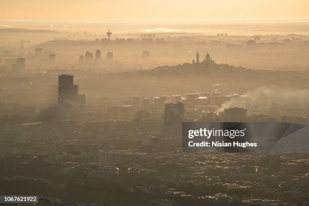 aerial flying over paris france at sunrise - el mirage stock-fotos und bilder