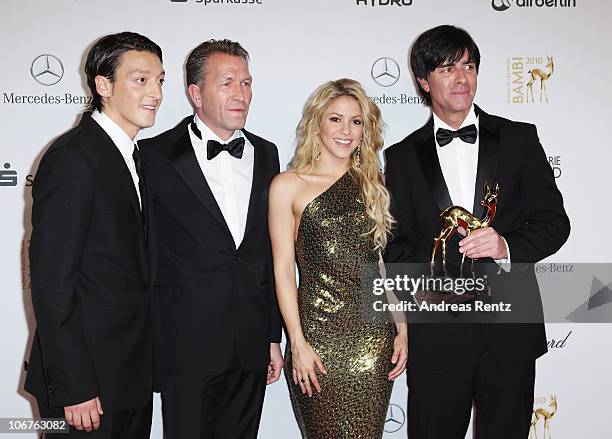 Mesut Oezil, Andreas Koepke, Shakira and Joachim Loew pose with the Special Bambi award at the Bambi 2010 Award Winners Board at Filmpark Babelsberg...