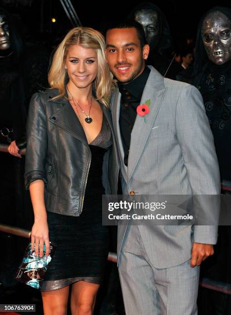 Melanie Slade and Theo Walcott attend the Harry Potter And The Deathly Hallows: Part 1 World film premiere at Odeon Leicester Square on November 11,...