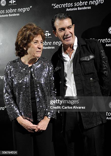 Cervantes Institute's president Carmen Caffarel poses with actor Antonio Banderas during the launch of his first photography exhibition 'Secretos...