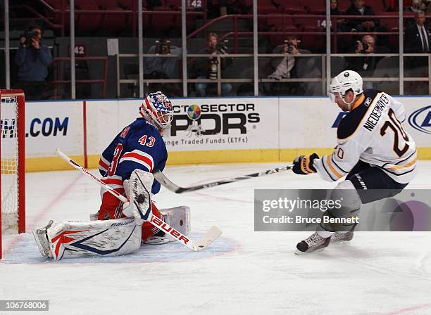 Rob Niedermayer of the Buffalo Sabres is stopped on a breakaway by Martin Biron of the New York Rangers at Madison Square Garden on November 11, 2010...