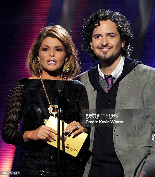 Actress Itati Cantoral and singer Tommy Torres present an award onstage during the 11th annual Latin GRAMMY Awards at the Mandalay Bay Events Center...
