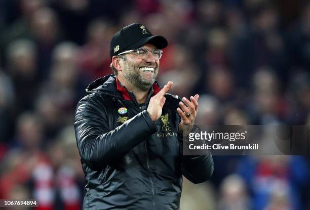 Jurgen Klopp, Manager of Liverpool celebrates after the Premier League match between Liverpool FC and Everton FC at Anfield on December 2, 2018 in...