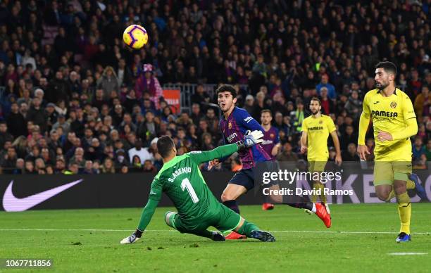 Carles Alena of Barcelona scores his team's second goal past Sergio Asenjo of Villareal during the La Liga match between FC Barcelona and Villarreal...