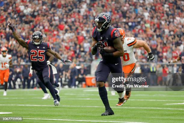 Zach Cunningham of the Houston Texans intercepts the ball and runs for a touchdown against the Cleveland Browns in the second quarterat NRG Stadium...