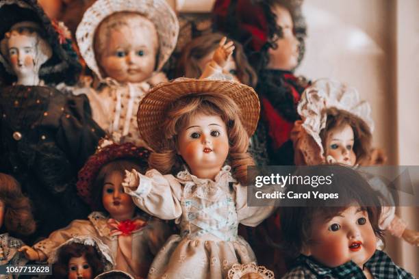 creepy vintage dolls - baby doll stock pictures, royalty-free photos & images