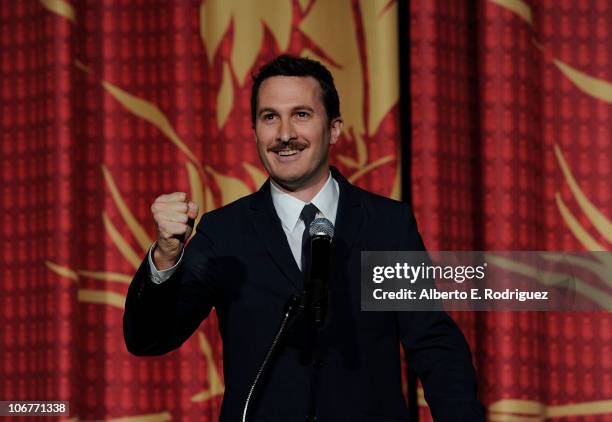 Darren Aronofsky speaks on stage at the "Black Swan" closing night gala during AFI FEST 2010 presented by Audi held at Grauman's Chinese Theatre on...