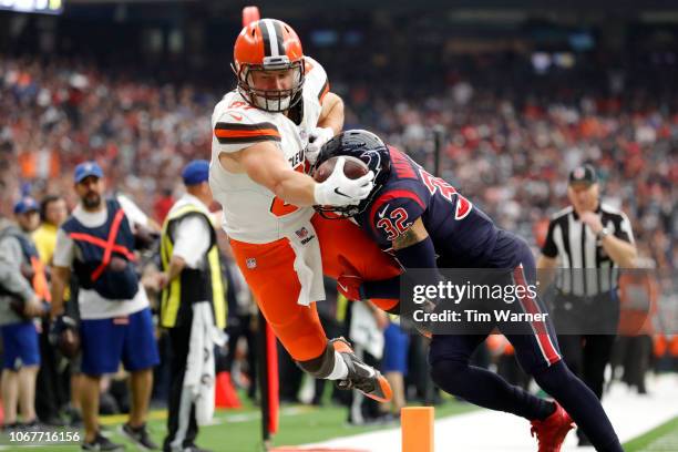 Tyrann Mathieu of the Houston Texans forces Seth DeValve of the Cleveland Browns out of bounds preventing a touchdown in the third quarter at NRG...