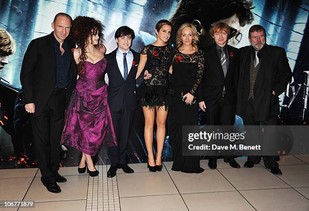 Actors Ralph Fiennes, Helena Bonham Carter, Daniel Radcliffe, Emma Watson, author J.K. Rowling, and actors Rupert Grint and Timothy Spall attend the...