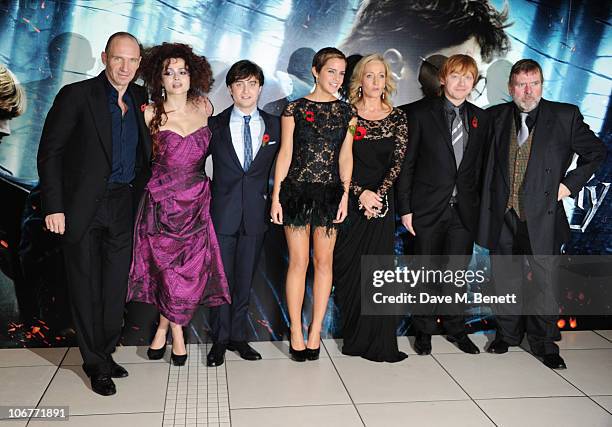 Actors Ralph Fiennes, Helena Bonham Carter, Daniel Radcliffe, Emma Watson, author J.K. Rowling, and actors Rupert Grint and Timothy Spall attend the...