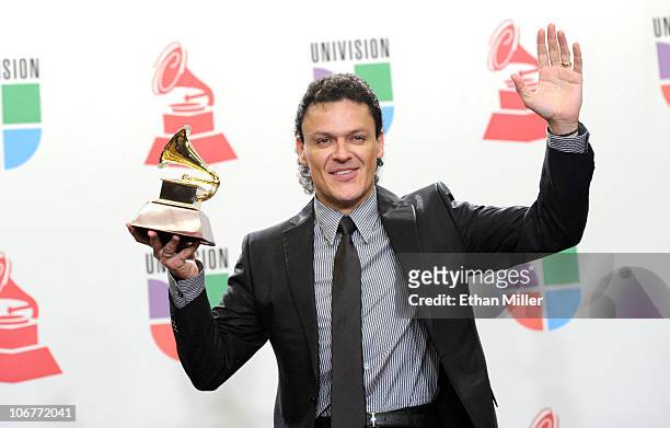 Singer Pedro Fernandez poses with the best ranchero album award in the press room during the 11th annual Latin GRAMMY Awards at the Mandalay Bay...