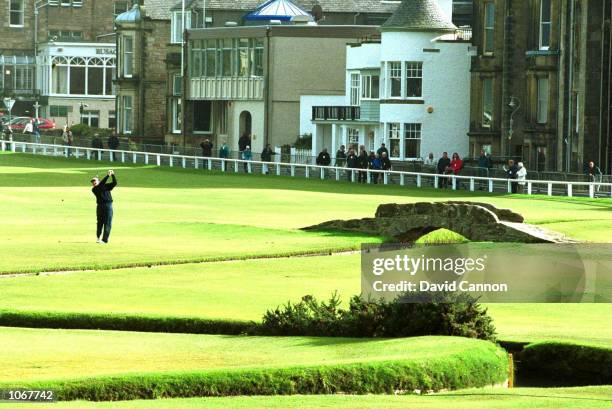 Colin Montgomerie of Scotland plays his second shot on the 1st hole during the first round of the Alfred Dunhill Cup played on the Old Course at St...