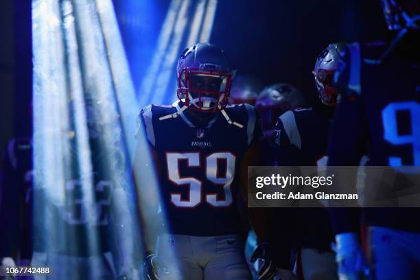 Albert McClellan of the New England Patriots walks through the tunnel before the game against the Minnesota Vikings at Gillette Stadium on December...