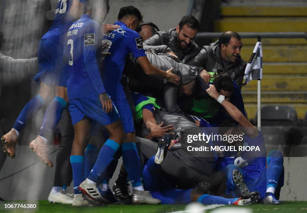 Porto's players celebrate a goal scored by Portuguese forward Hernani during the Portuguese league football match between Boavista FC and FC Porto at...