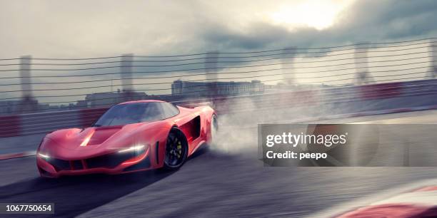 generic red supercar drifting around racetrack bend with smoking tires - car turning stock pictures, royalty-free photos & images