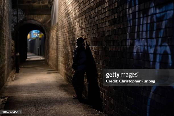 Prostitute waits for a customer on the streets of Holbeck, the only 'managed' zone for prostitution in the UK on November 14, 2018 in Leeds, England....