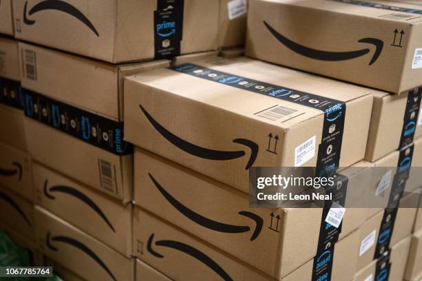 Items in "Amazon Prime" branded packaging are seen at the Amazon Fulfillment Centre on November 14, 2018 in Hemel Hempstead, England. The online...