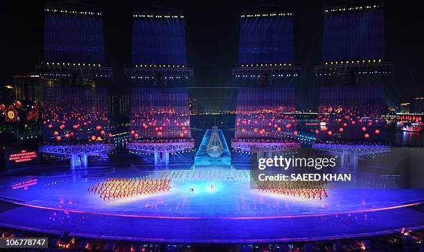 Artists perform during the opening ceremony of the 16th Asian Games in Guangzhou on November 12, 2010. The 15-day Asian Games officially opened with...