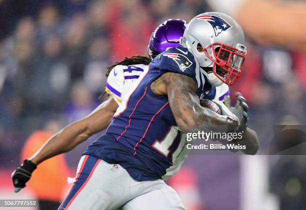 Josh Gordon of the New England Patriots runs on his way to scoring a touchdown during the third quarter against the Minnesota Vikings at Gillette...