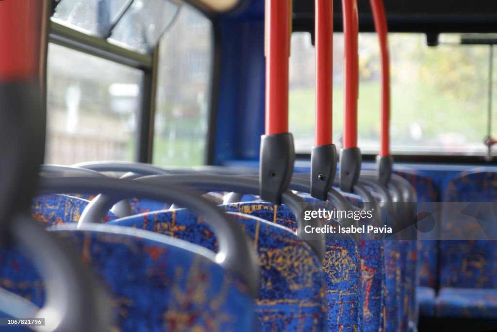 Cropped shot of empty seats on a public bus