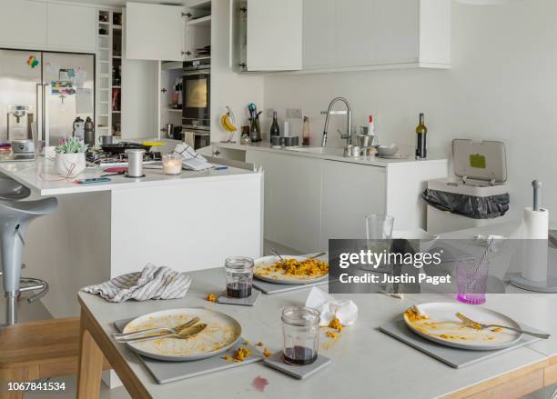 post dinner dining table - dirty room stock pictures, royalty-free photos & images