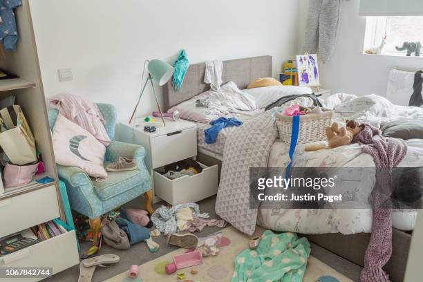 young girl's messy bedroom - dirty room stock pictures, royalty-free photos & images