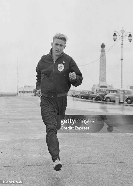 Norwegian sprinter and track athlete Richard Simonsen pictured on a training run on Plymouth Hoe in Plymouth, England on 20th June 1963.