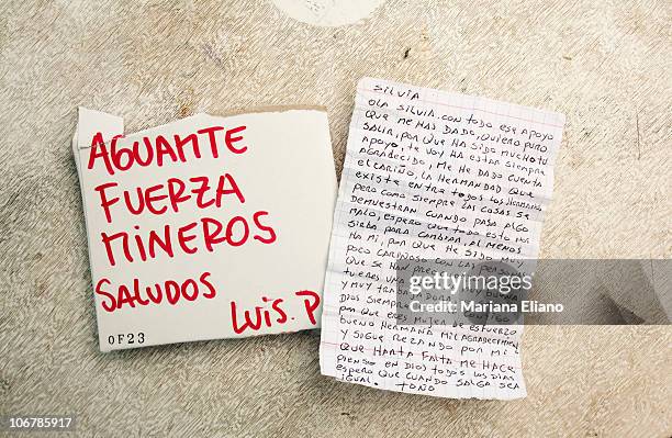 Message written by a trapped miner and a letter written to a trapped miner by a relative at Campamento Esperanza at the San Jose Mine in September...