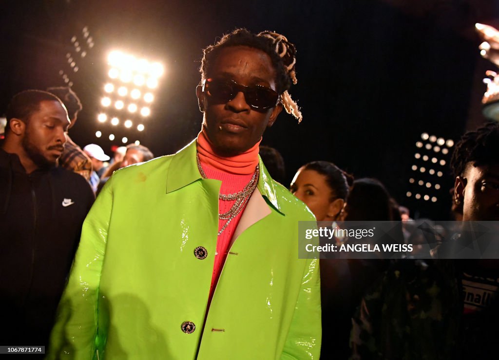 Verzayce Rapper US rapper Young Thug attends at the Versace Pre-Fall 2019 Runway Show ...