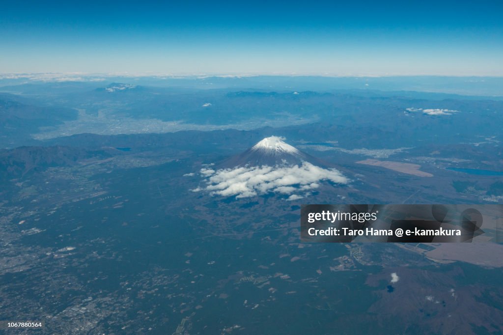 Snow-capped Mt. Fuji in Japan daytime aerial view from airplane