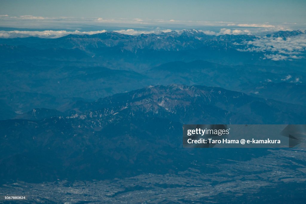 Kiso Mountains (Central Alps) and Hida Mountains (Northern Alps) in Japan daytime aerial view from airplane