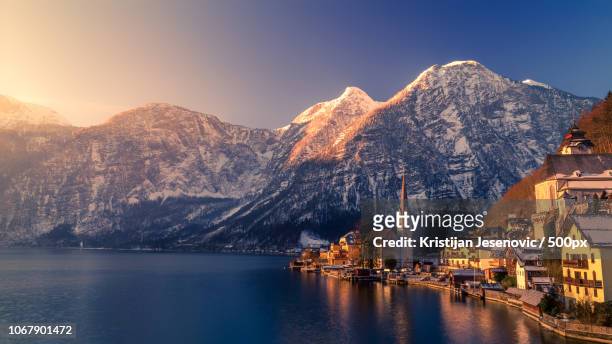 landscape of townscape by snowcapped mountains - lake zurich stock pictures, royalty-free photos & images