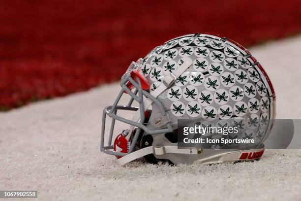 Ohio State Buckeye helmet sits on the turf prior to the Big Ten Conference Championship game between the Northwestern Wildcats and the Ohio State...