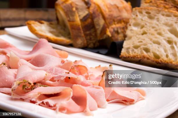 close-up of ham and bread - sliced ham stock pictures, royalty-free photos & images